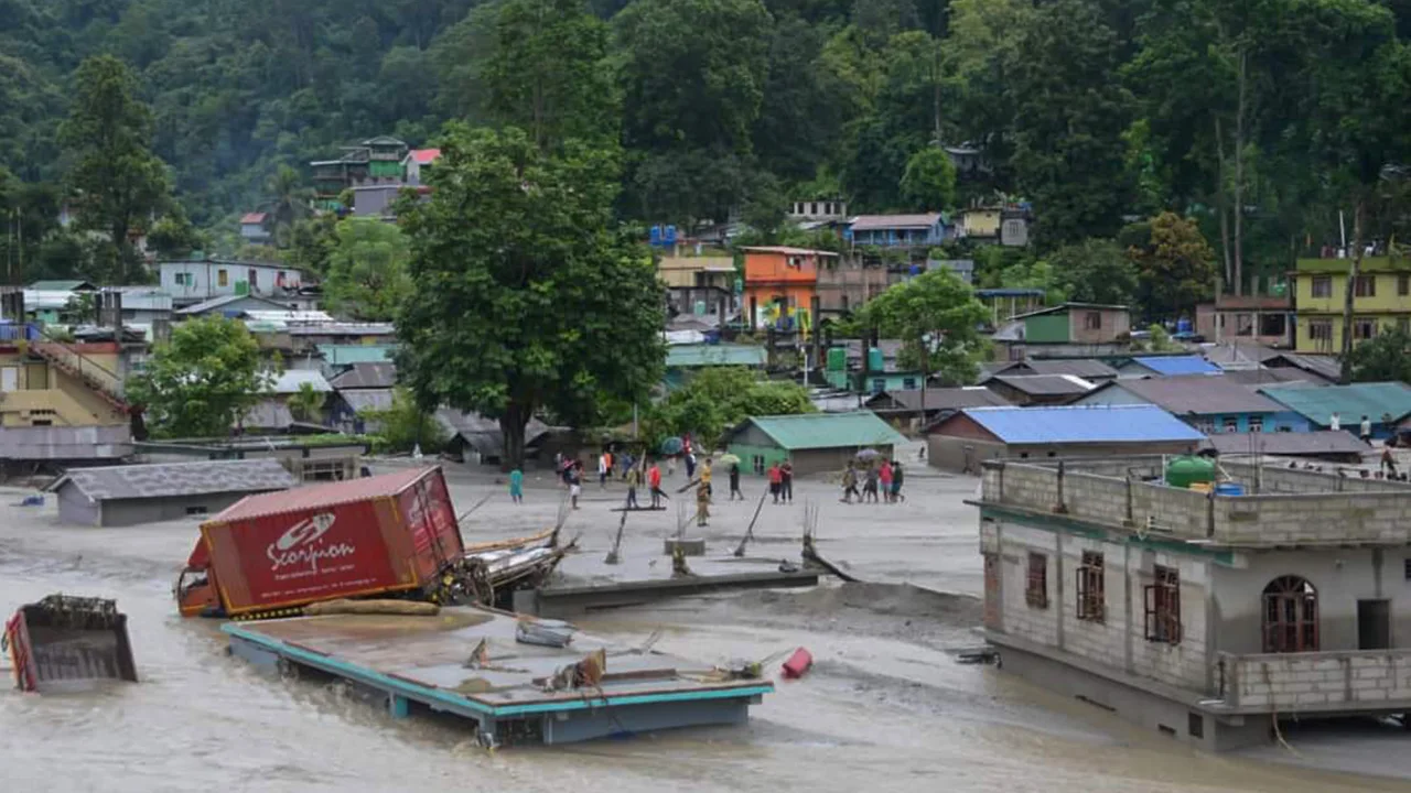 19 people killed and 100 missing as glacial lake explodes in India