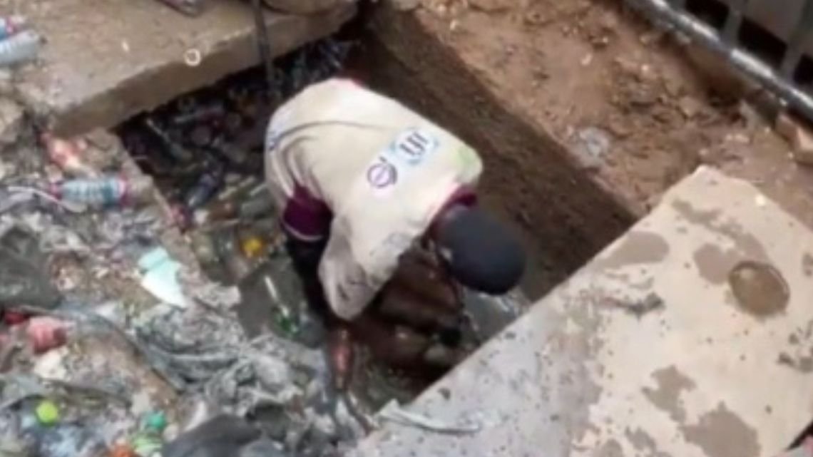 Suspected thief forced to desilt choked gutters with bare hands in Kumasi